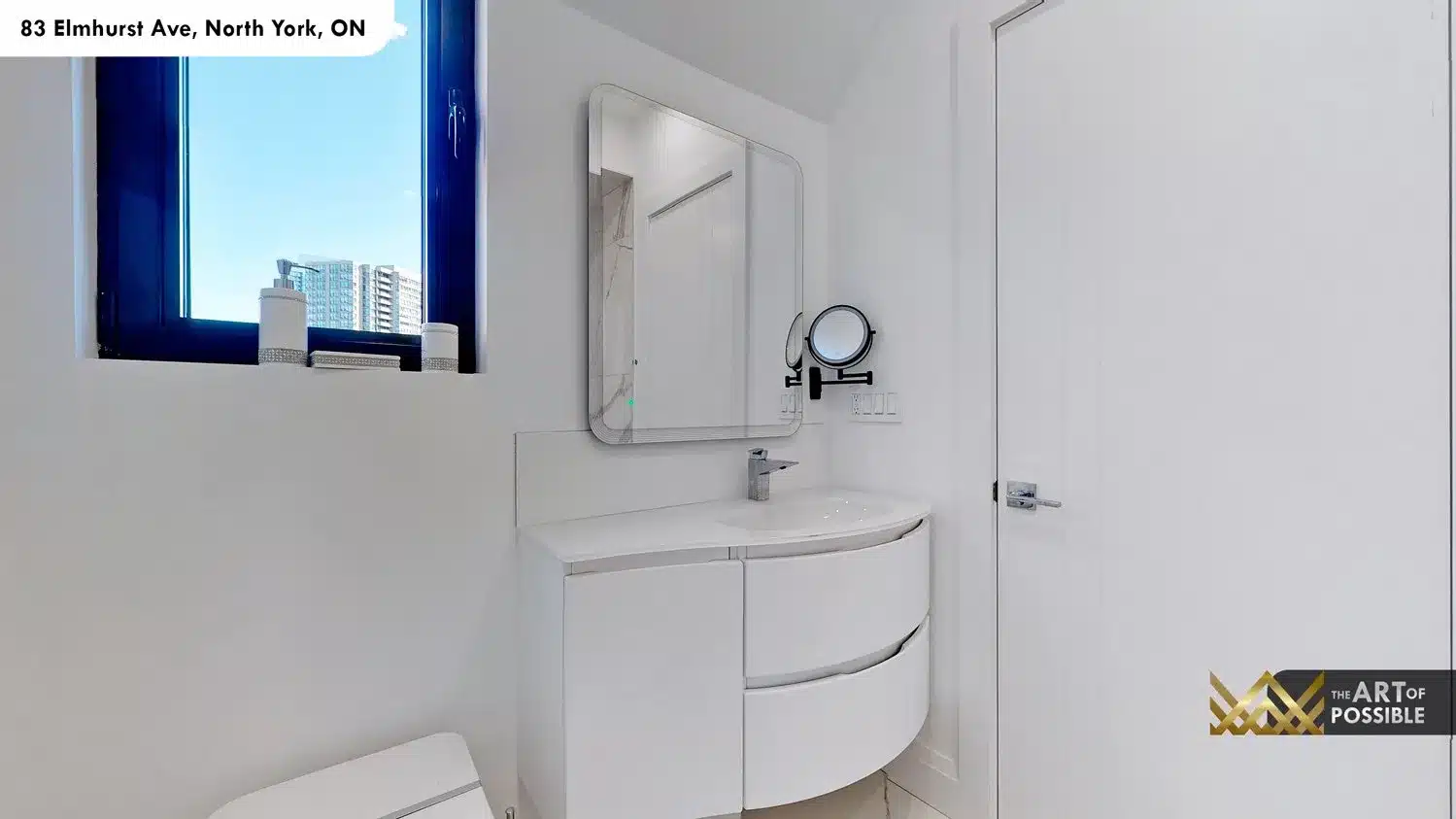 83 Elmhurst Ave North York secondary bathroom curved vanity backlit mirror city view
