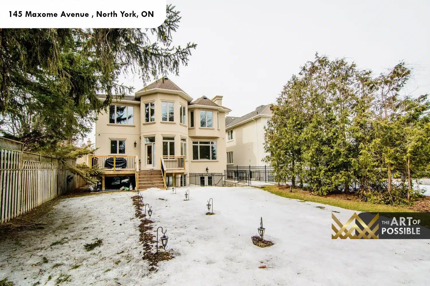 145 Maxome Avenue rear elevation turret walk-out deck deep lot mature trees