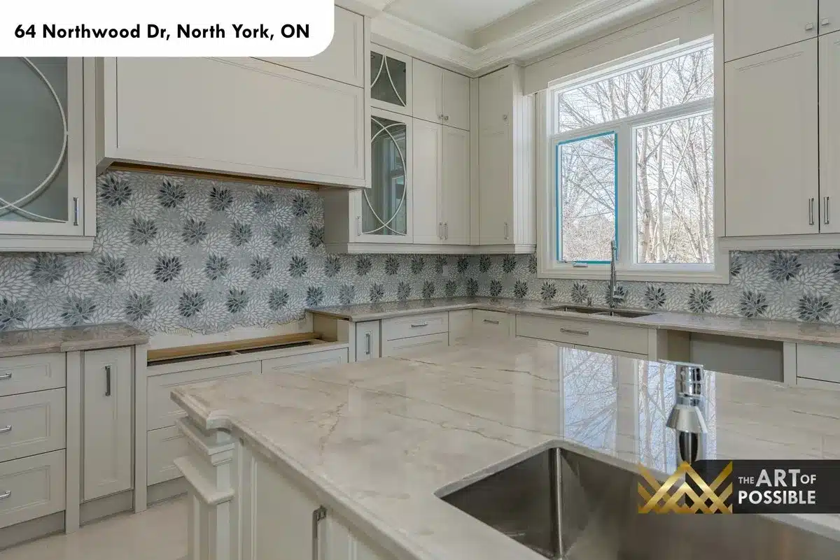 Kitchen stone island countertop and backsplash tile detail