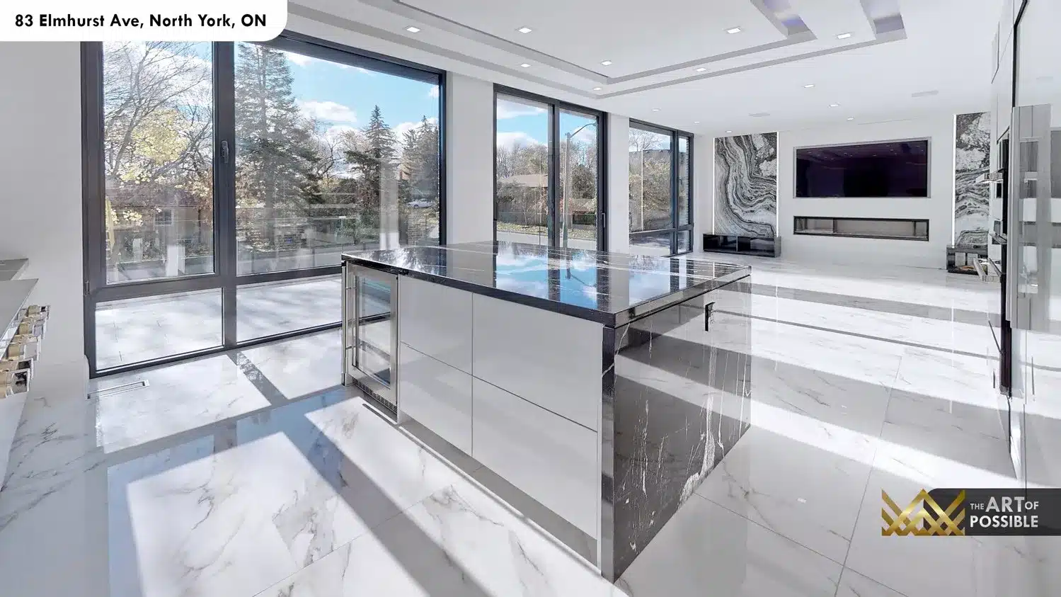 83 Elmhurst Ave North York kitchen open plan view to family room marble fireplace