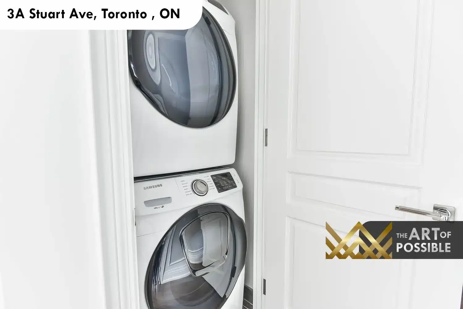 Upper floor laundry closet at 3A Stuart Ave with stacked Samsung washer and dryer