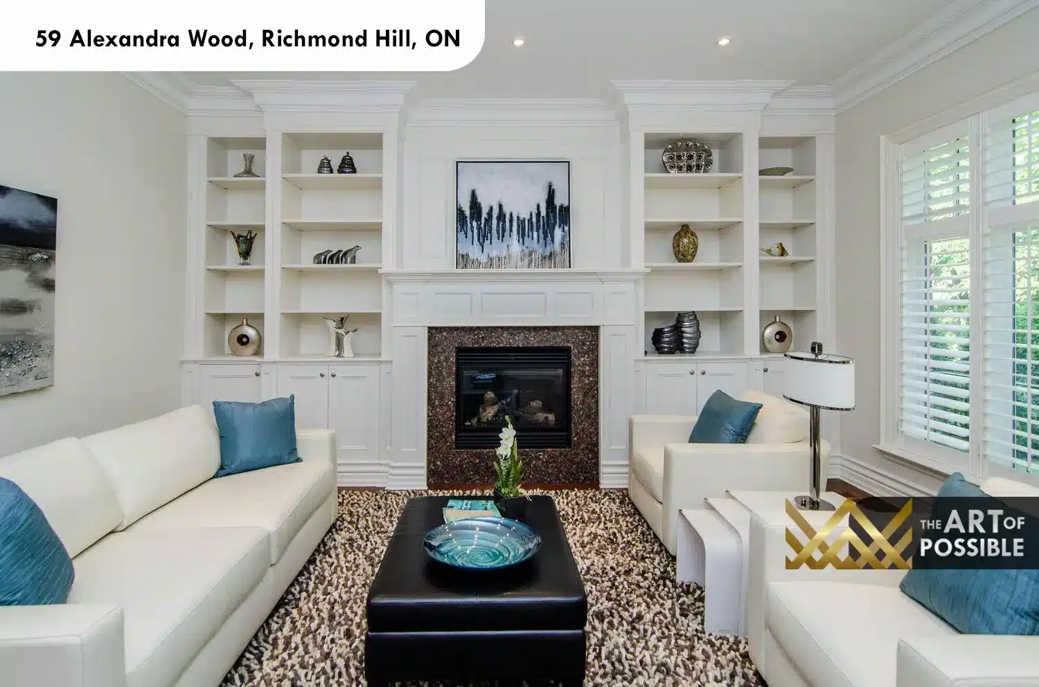 59 Alexandra Wood North York family room built-in bookshelves fireplace dark stone surround plantation shutters