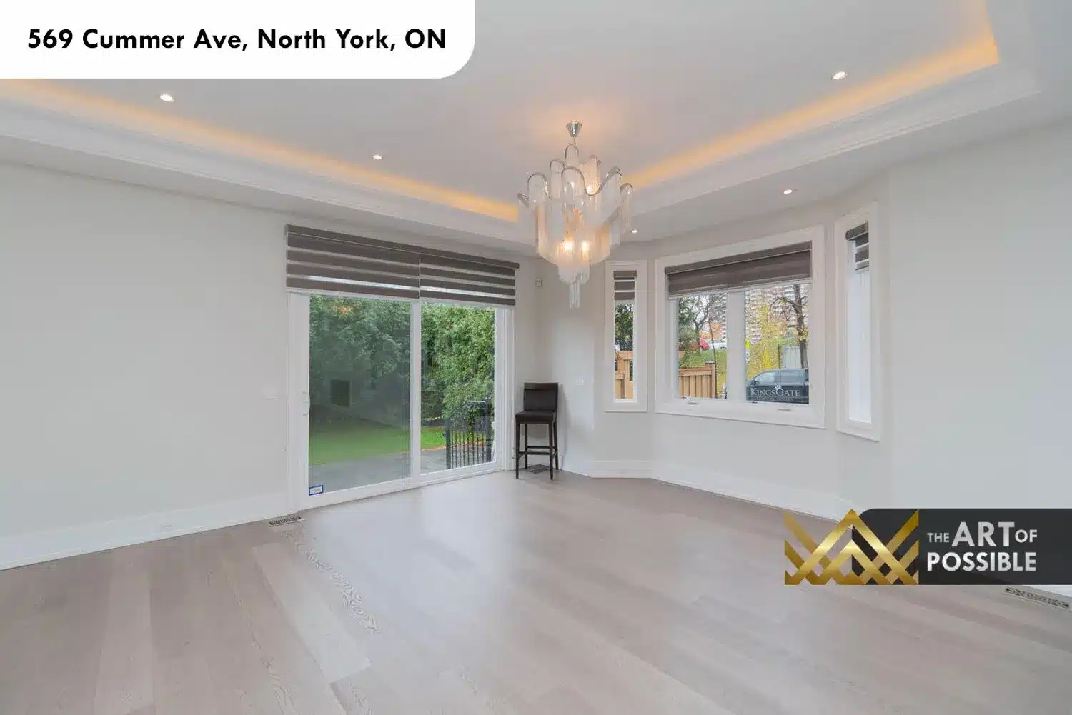 569 Cummer Ave dining room tray ceiling cove lighting Murano glass chandelier sliding glass door