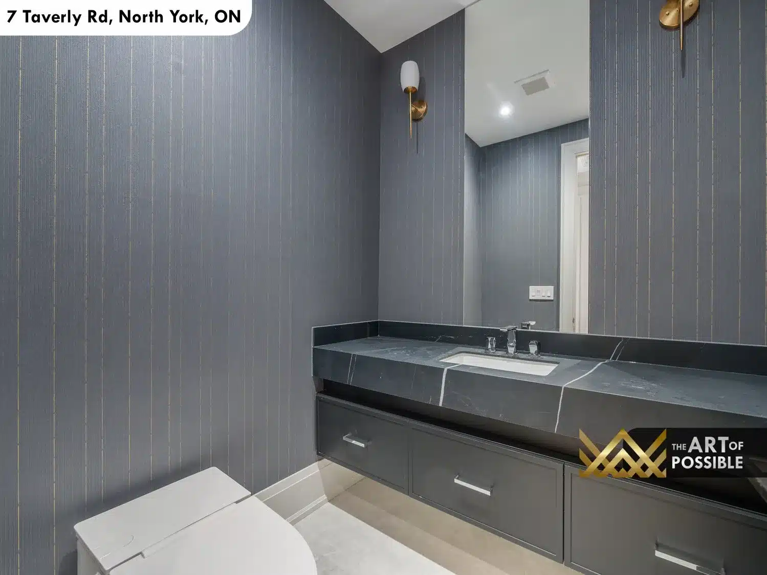 Main floor powder room with dark textured wallpaper and floating marble vanity